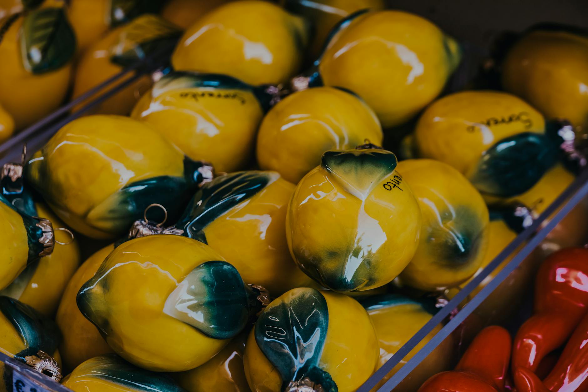 Vibrant yellow ceramic lemons artfully arranged, symbolizing renewed vitality and sensuality
